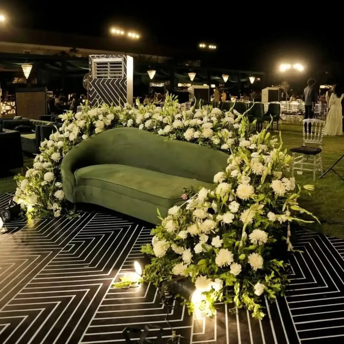 Wedding venue decorated with marigold and lights