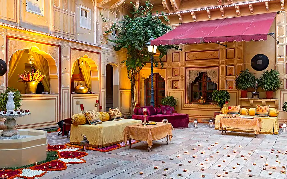 Samode Palace - Royal Courtyard with Traditional Decor and Amber Lighting