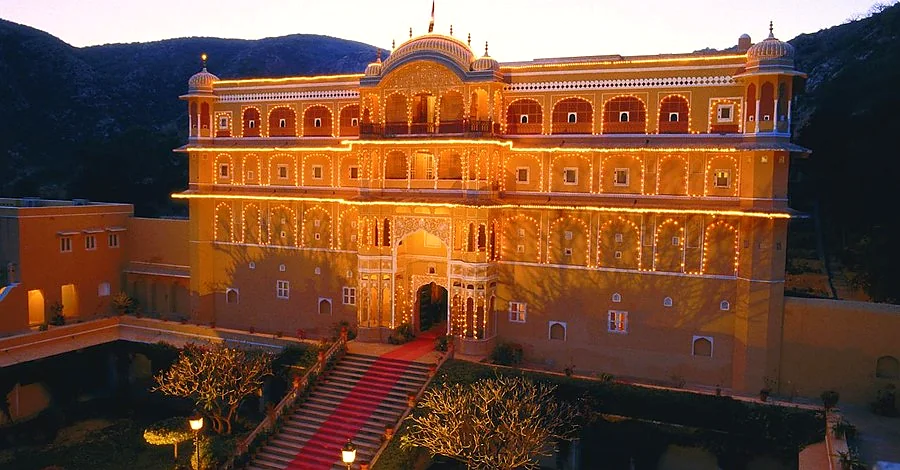 Samode Palace - Illuminated Heritage Palace at Night with Aravalli Mountains